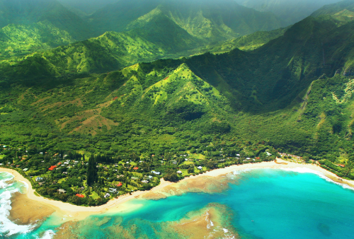Hawaii aerial view, shoreline beach, lush green mountains