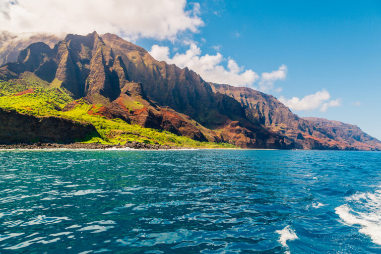 Steep, beautiful coast cliffs, view from ocean.