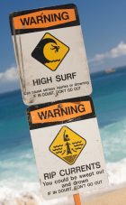 Surf and Currents Warning Sign on a beach in Hawaii.